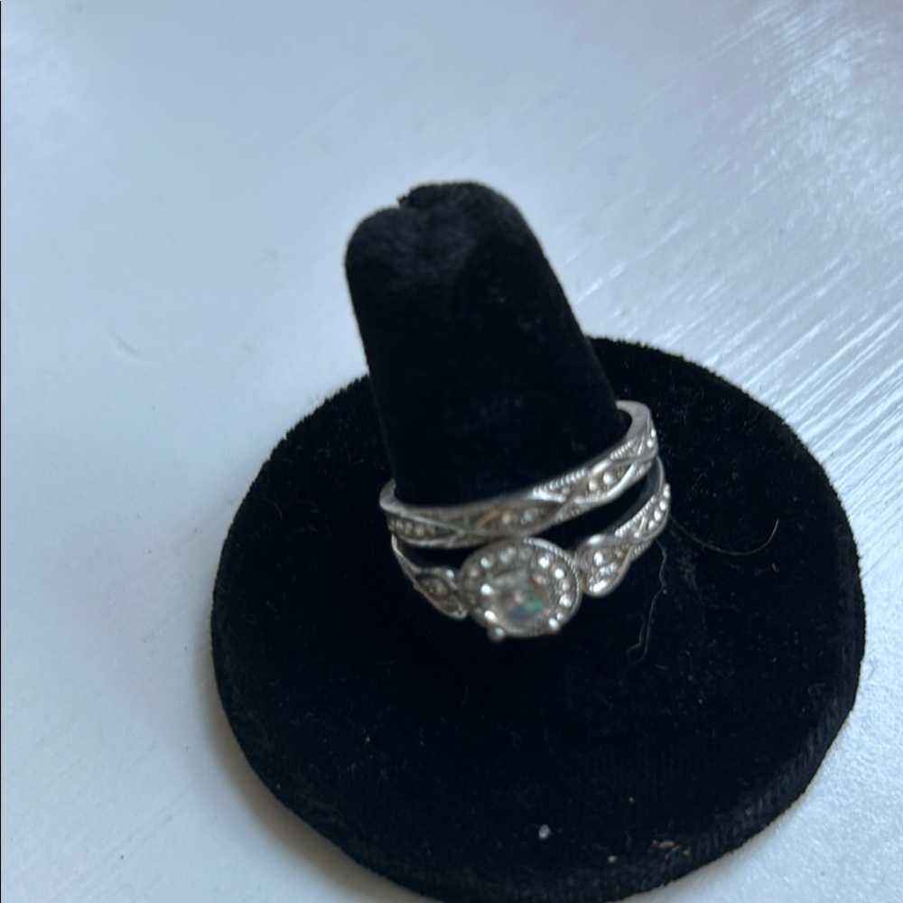 Engagement ring or wedding ring the non expensive kind but still very lovely.